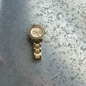 Fossil Women’s Watch (Gold with diamonds around watch face)